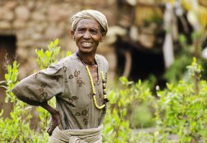 Rural Ethiopian woman standing with hand on hip